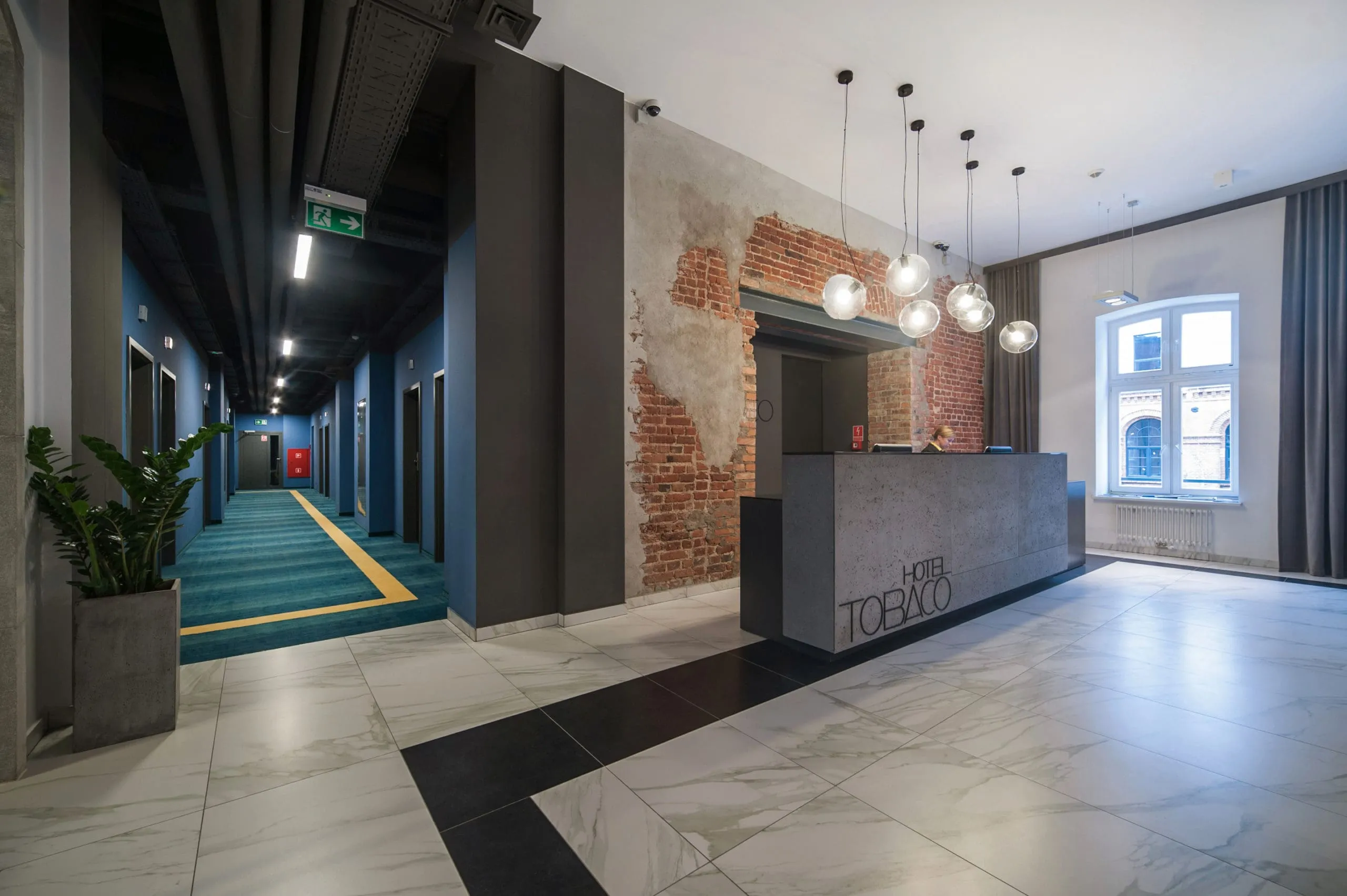 ConcreAte dekorativer Beton — Projekt Hotel Tobaco / Łódź